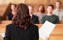 Adams Harrison Business Law picture Experienced lawyer giving legal advice in a courtroom setting at Adams Harrison.