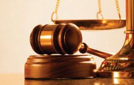 Adams Harrison Criminal Law Justice gavel and scales of justice symbolizing legal expertise and law services at Adams Harrison.