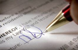 Adams Harrison Wills and Probate Law picture Professional property legal signing at Adams Harrison estate agents.